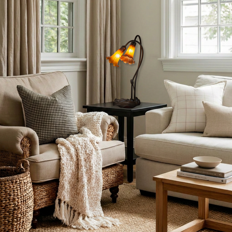16 inch small tiffany lamp amber pond lily on end table in living room.