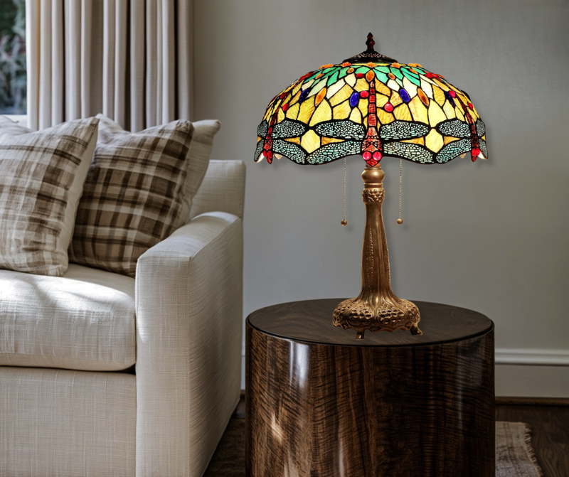Tiffany dragonfly table lamp on end table in living room.