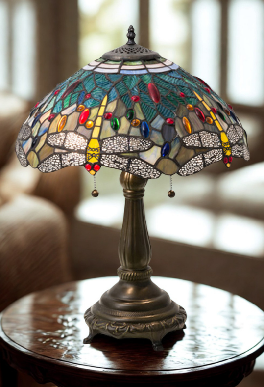 Hanginghead dragonfly table lamp on end table. 
