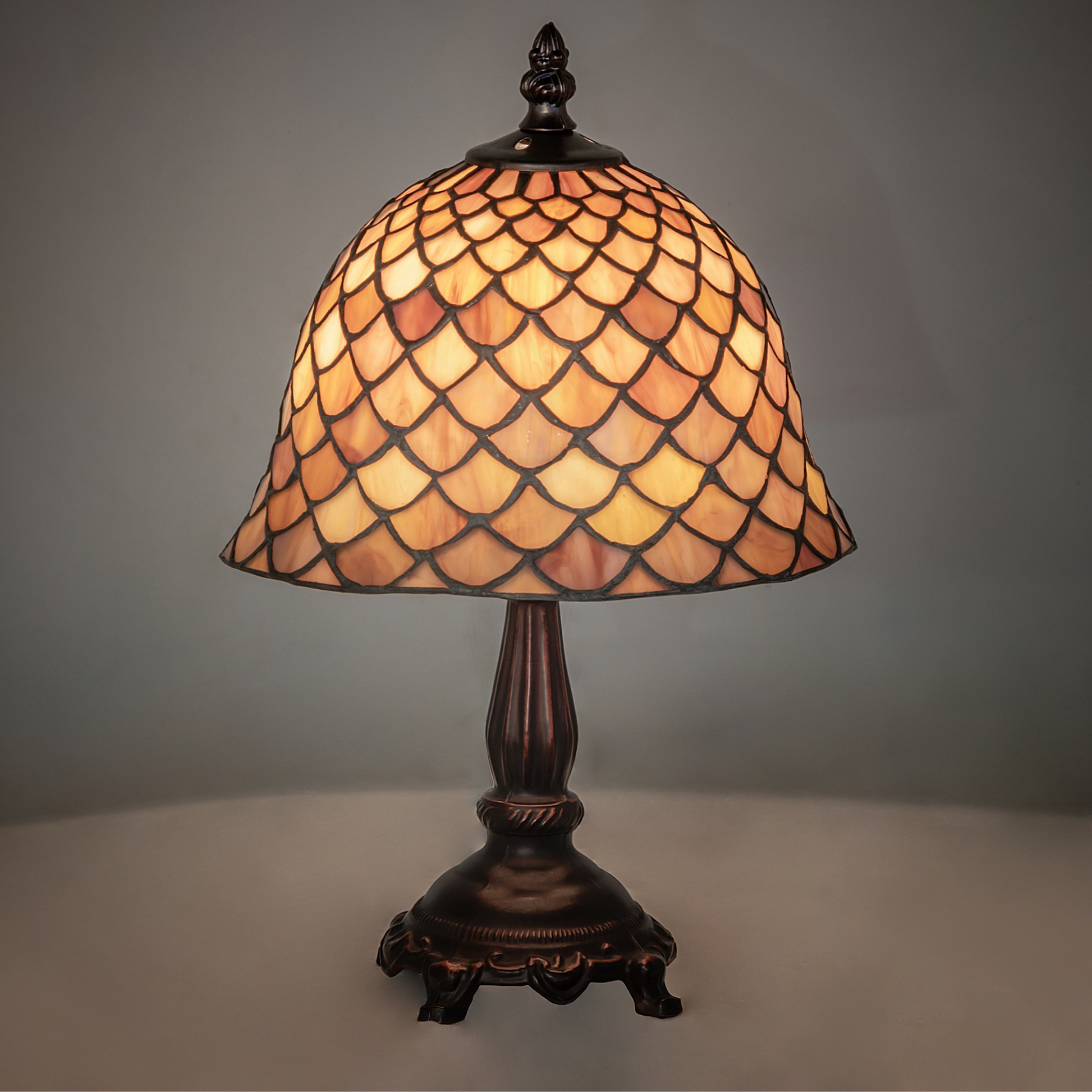 12-inch small tiffany lamp fishscale on dark background. 