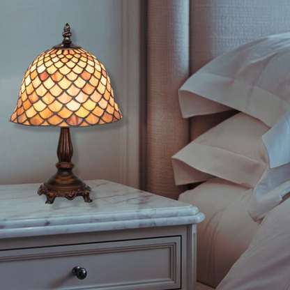 12-inch small tiffany lamp fishscale on nightstand in bedroom. 