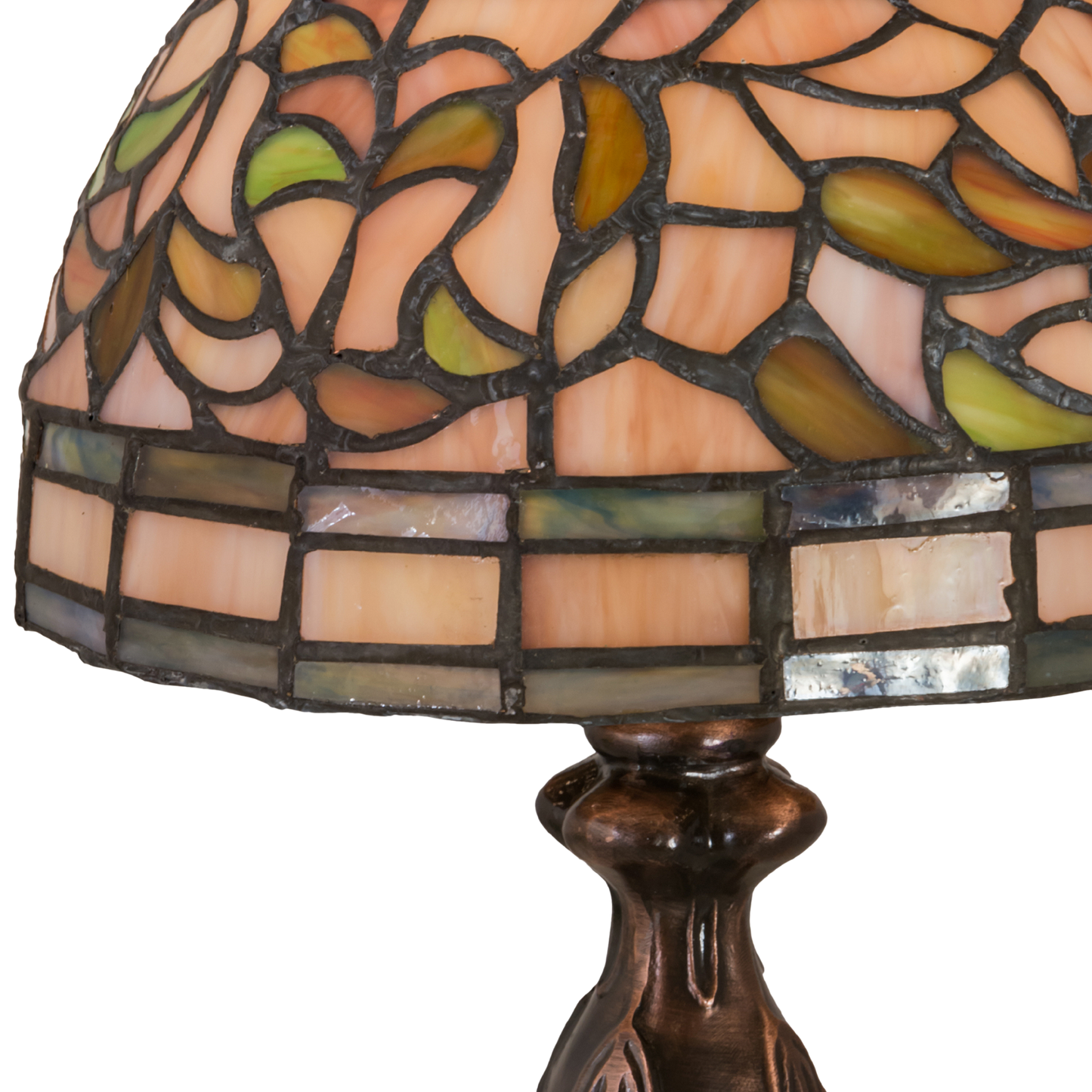 13.5 inches small tiffany lamp turning leaf. Close up of stained glass. 
