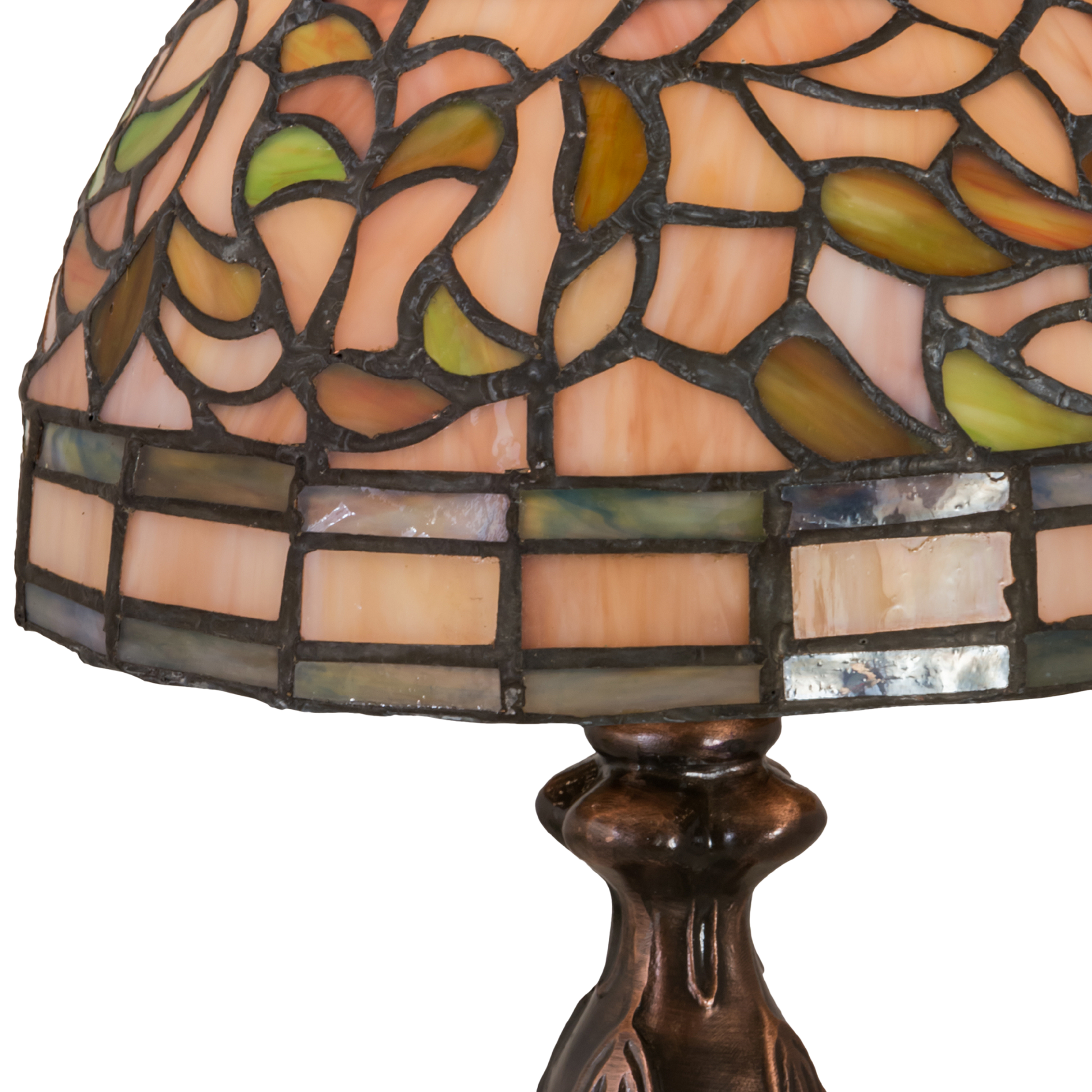 13.5 inches small tiffany lamp turning leaf. Close up of stained glass. 