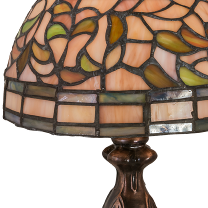 13.5 inches small tiffany lamp turning leaf. Close up of stained glass. 