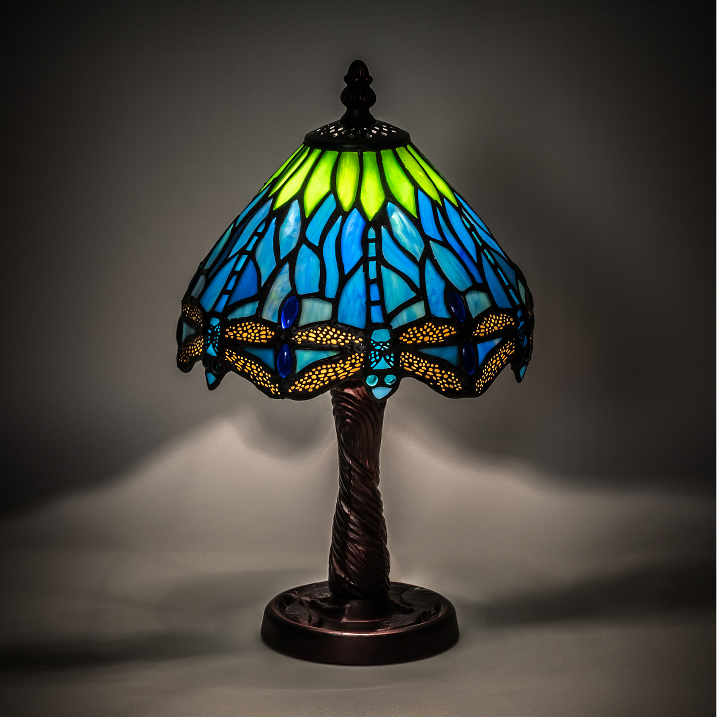 13 inch tiffany dragonfly lamp on dark background.