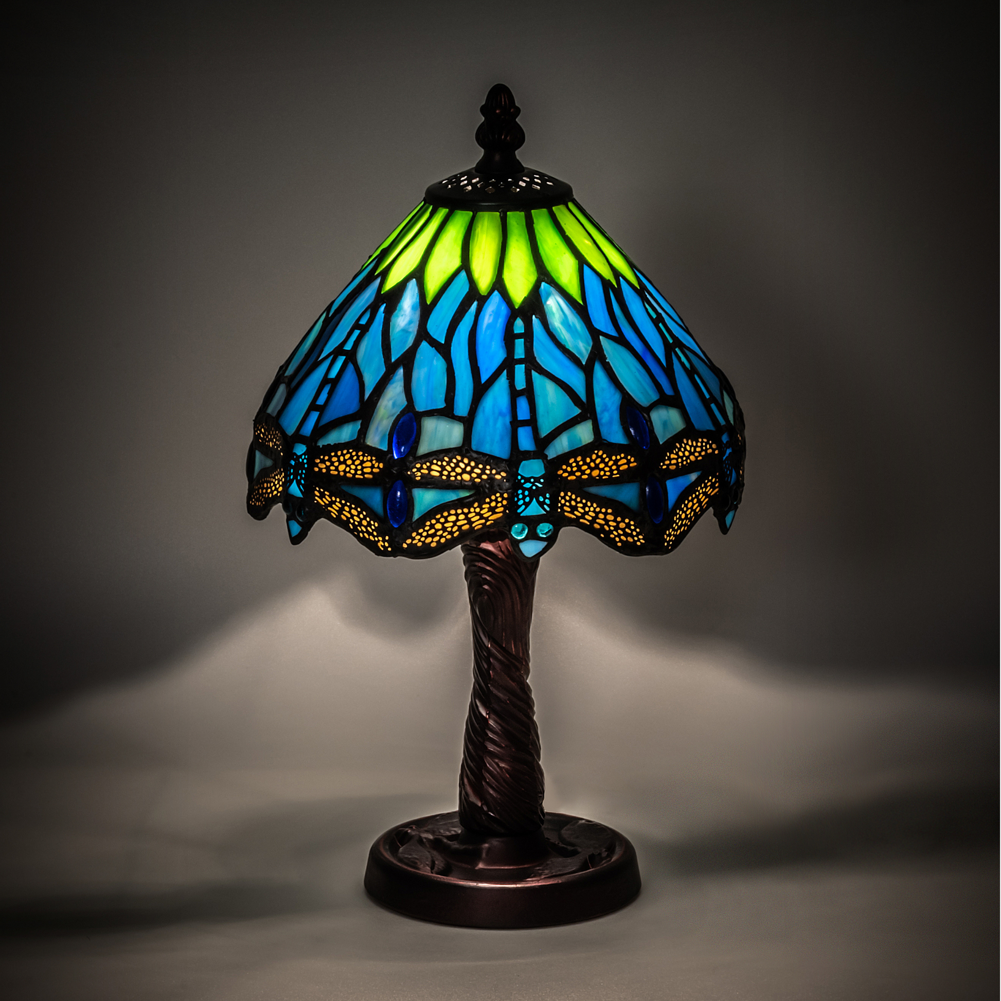 13 inch tiffany dragonfly lamp on dark background.