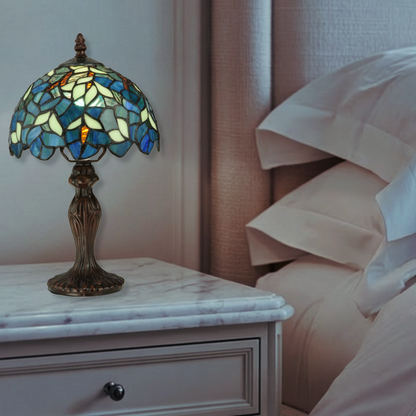 14 inch tiffany wisteria lamp nightfall on nightstand in bedroom. 