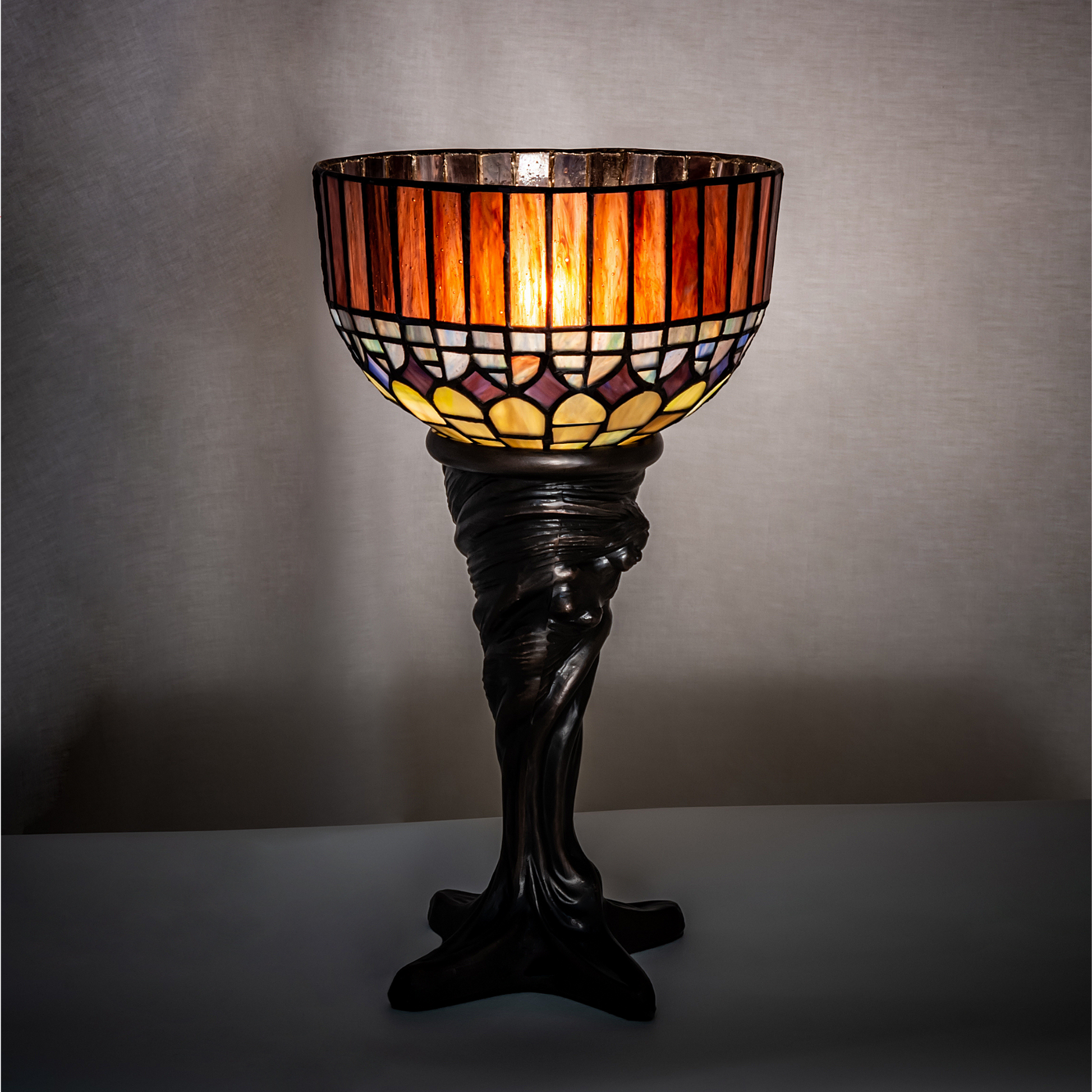 15 inch small tiffany lamp candice on dark background. 