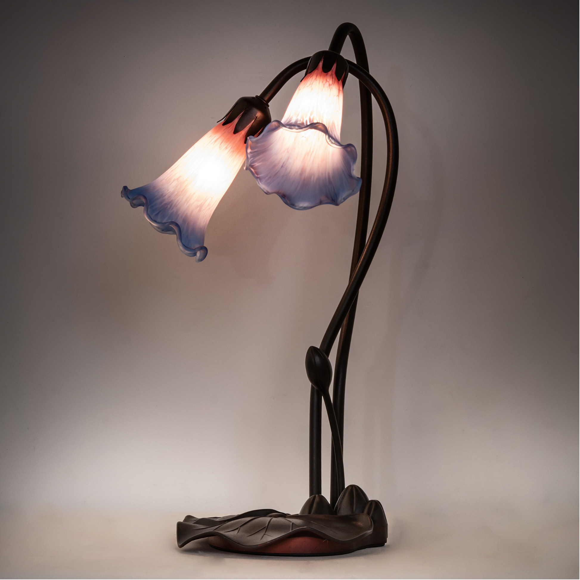 16-inch small tiffany lamp pink blue pond lily on dark background. 