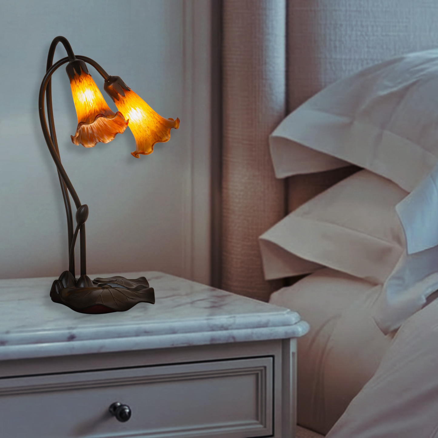 16 inch small tiffany lamp amber pond lily on nightstand in bedroom. 