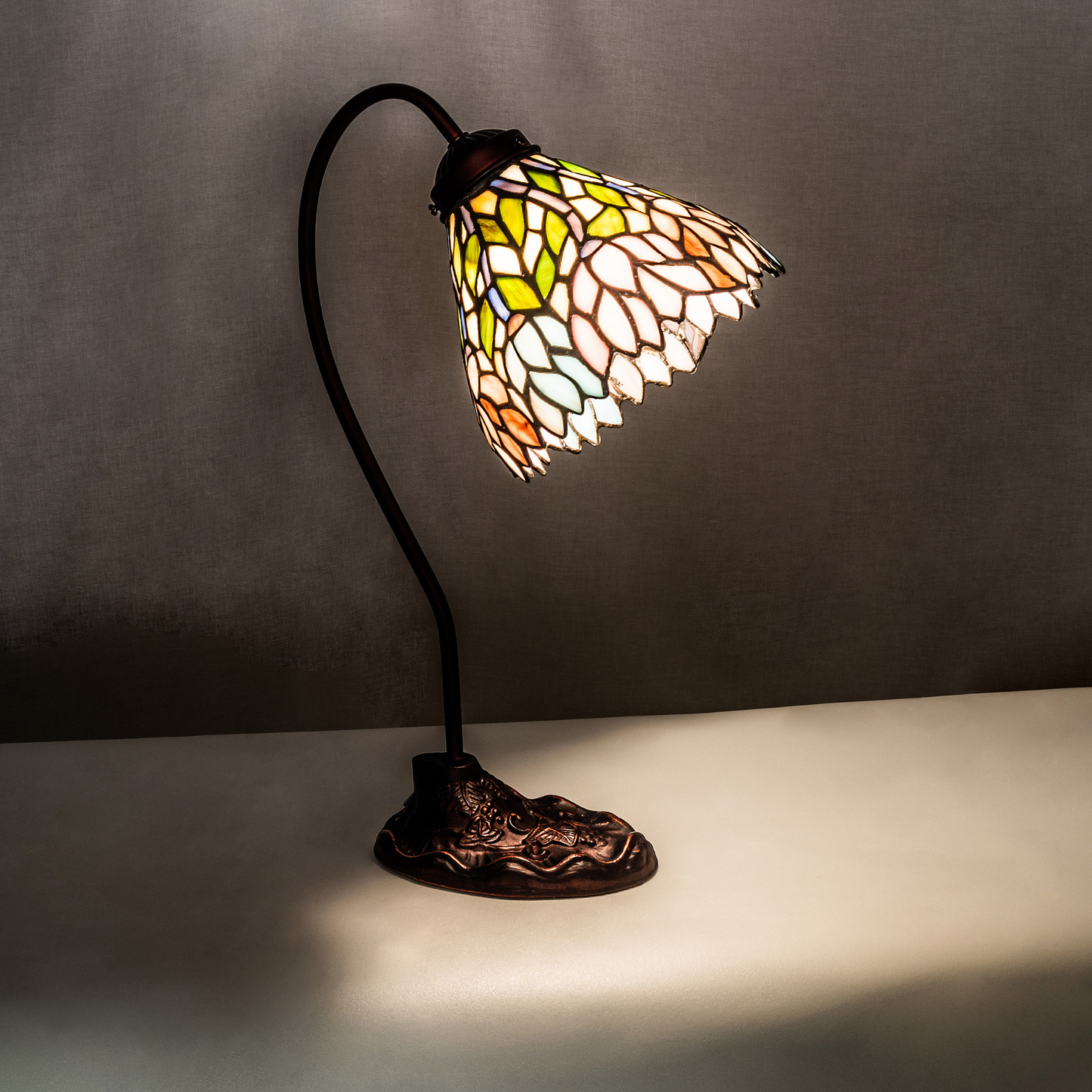 18-inch tiffany desk lamp wisteria on dark background.