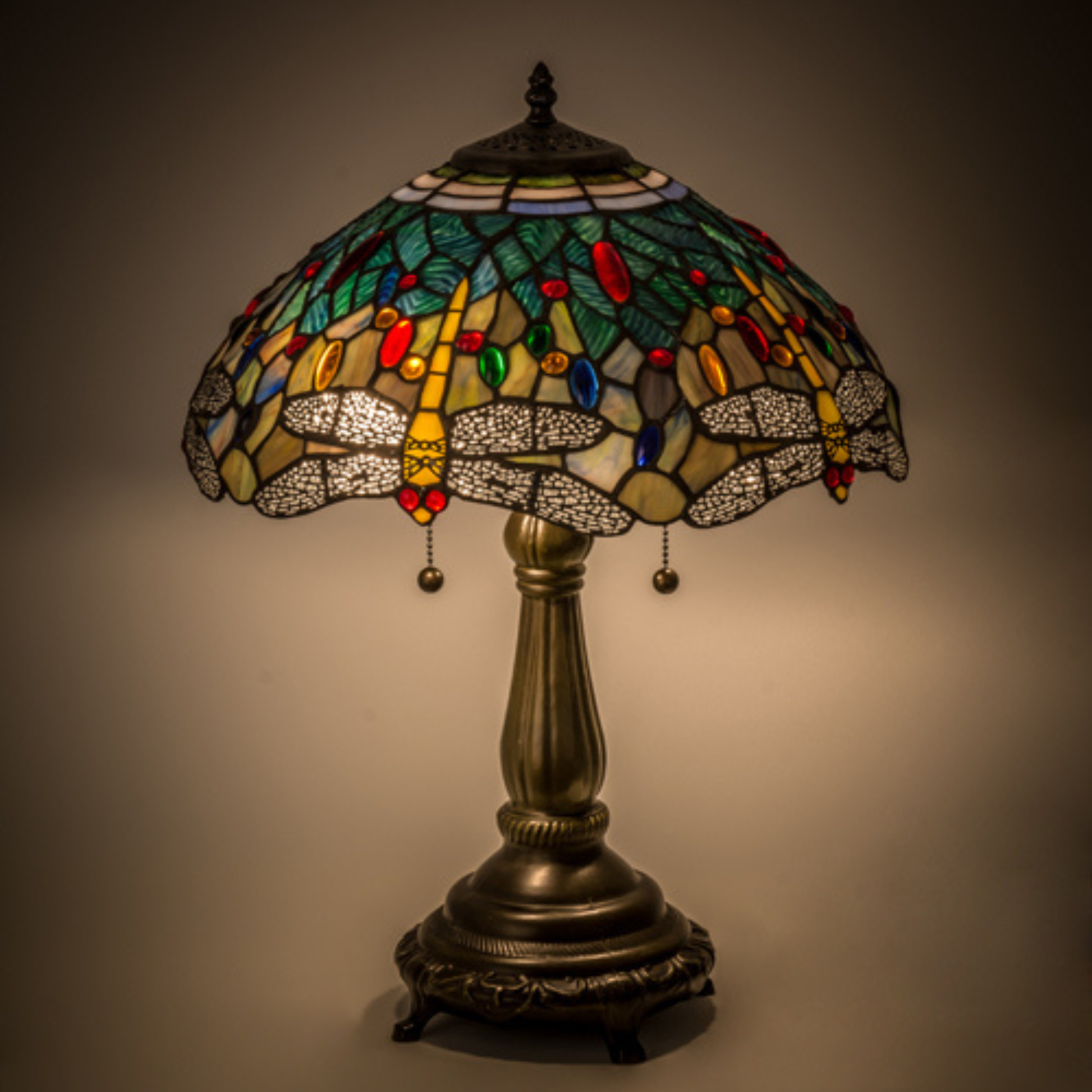 22-Inch Tiffany Table Lamp Dragonfly on dark background. 