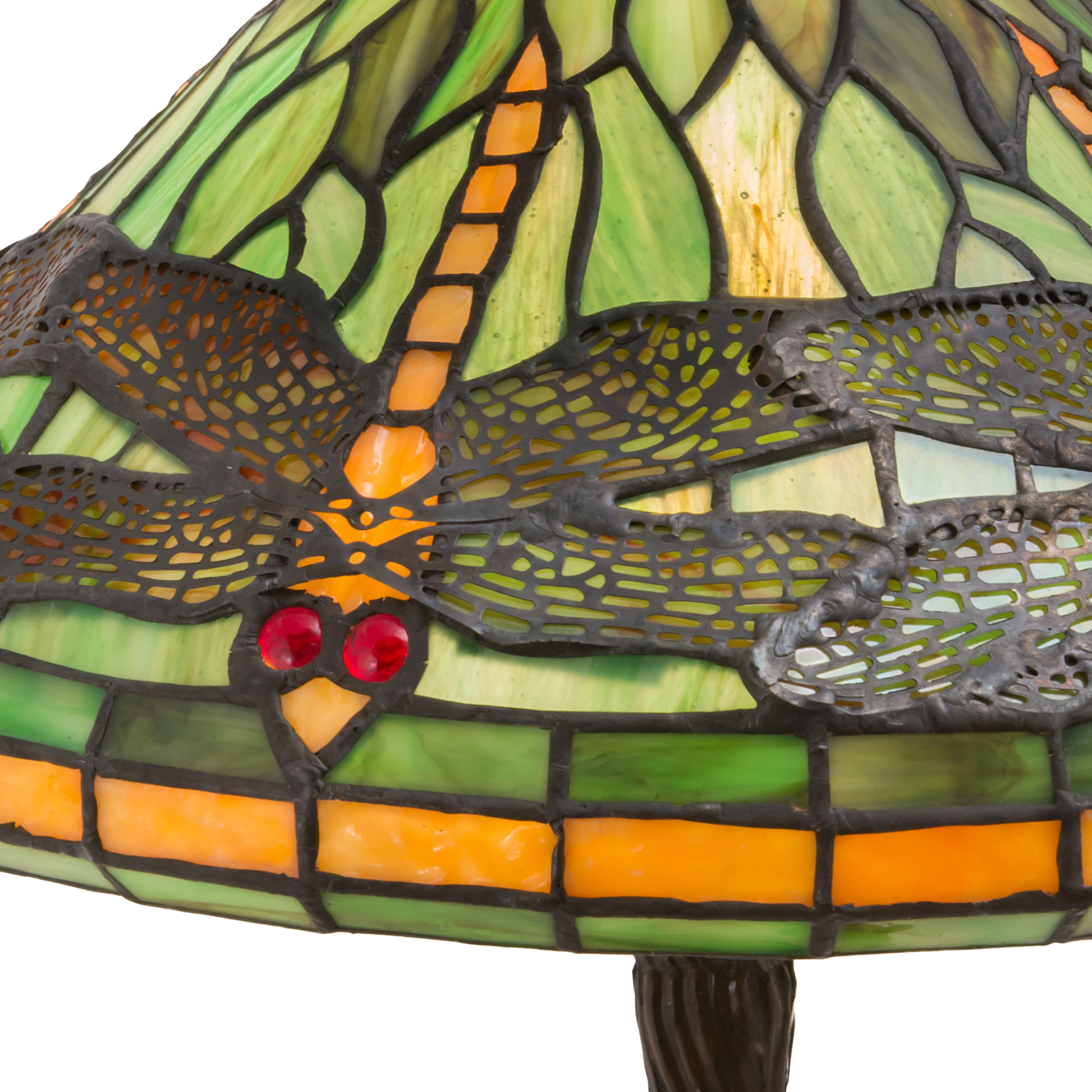 22-Inch Tiffany Table Lamp Dragonfly on end table in living room. Close up of glass shade. 