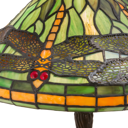 22-Inch Tiffany Table Lamp Dragonfly on end table in living room. Close up of glass shade. 