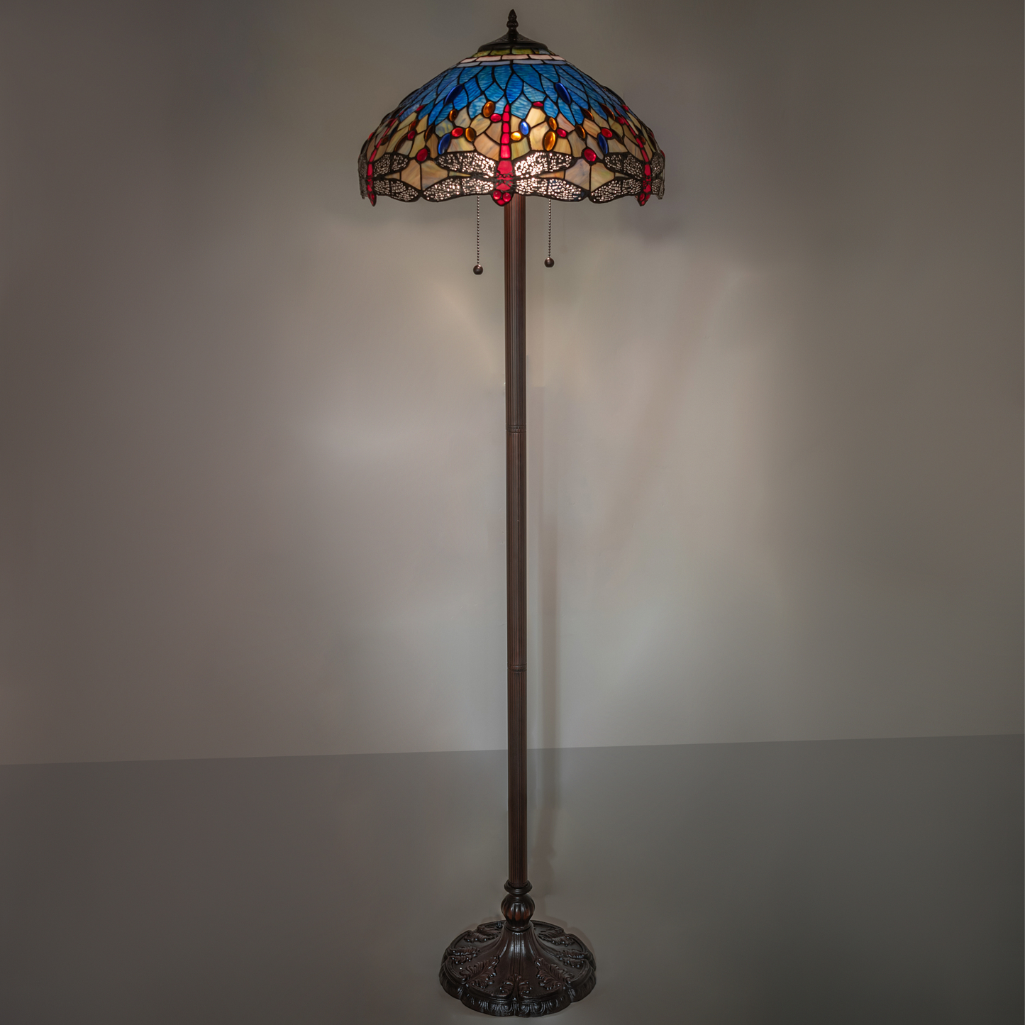 61-inch Tiffany floor lamp dragonfly hanginghead on dark background.