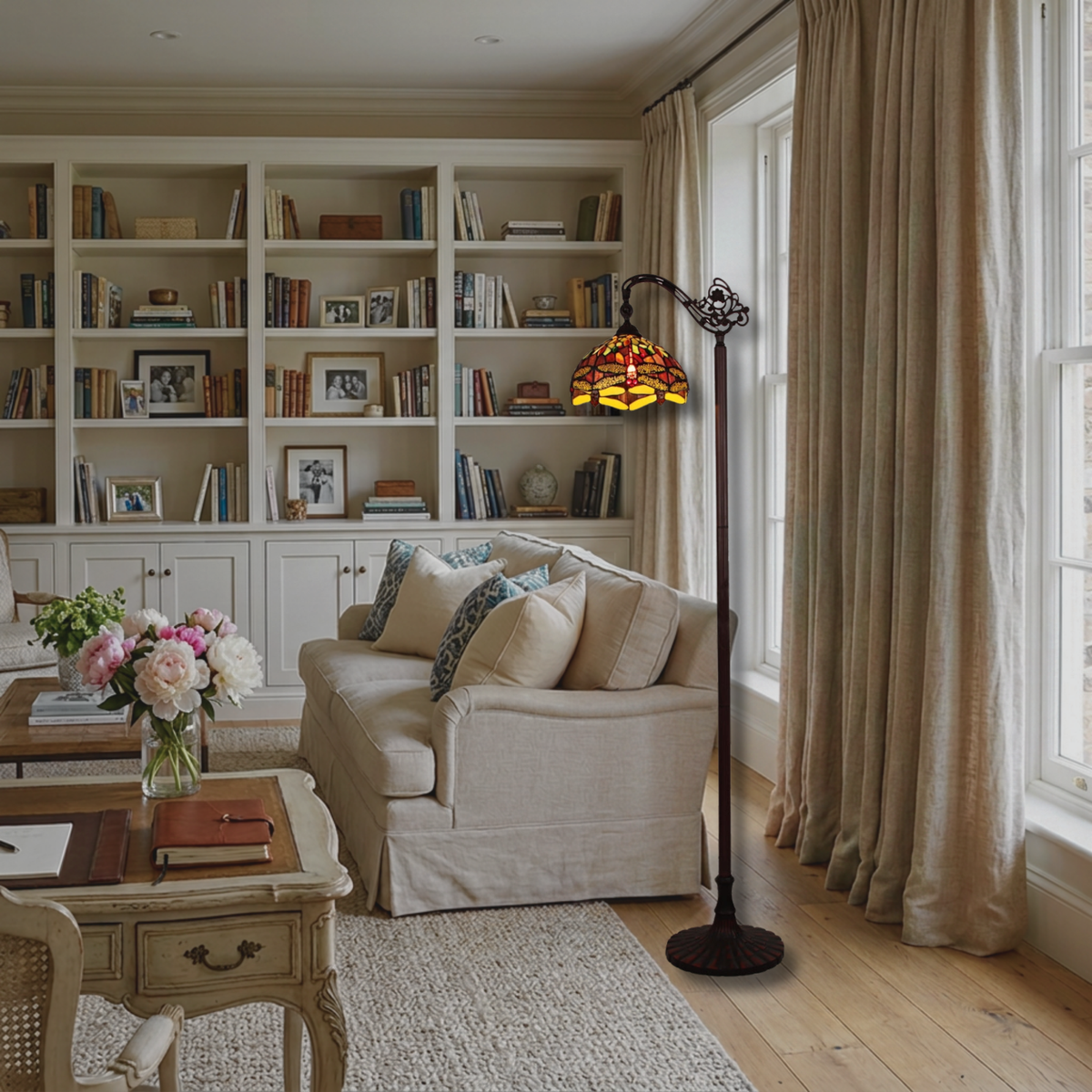 64-inch Tiffany Type Floor Lamp Empress Dragonfly Reading by Chloe Lighting. Living room setting.