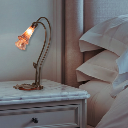 Title: 16-inch Tiffany Flower Lamp Purple Iridescent Pond Lily Accent. On nightstand in bedroom
